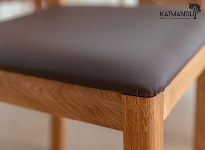 Eleganter Esszimmerstuhl Prato Eiche mit Sitzpolster braun -  Massivholz Stuhl mit braunem Kunstleder Sitzpolster